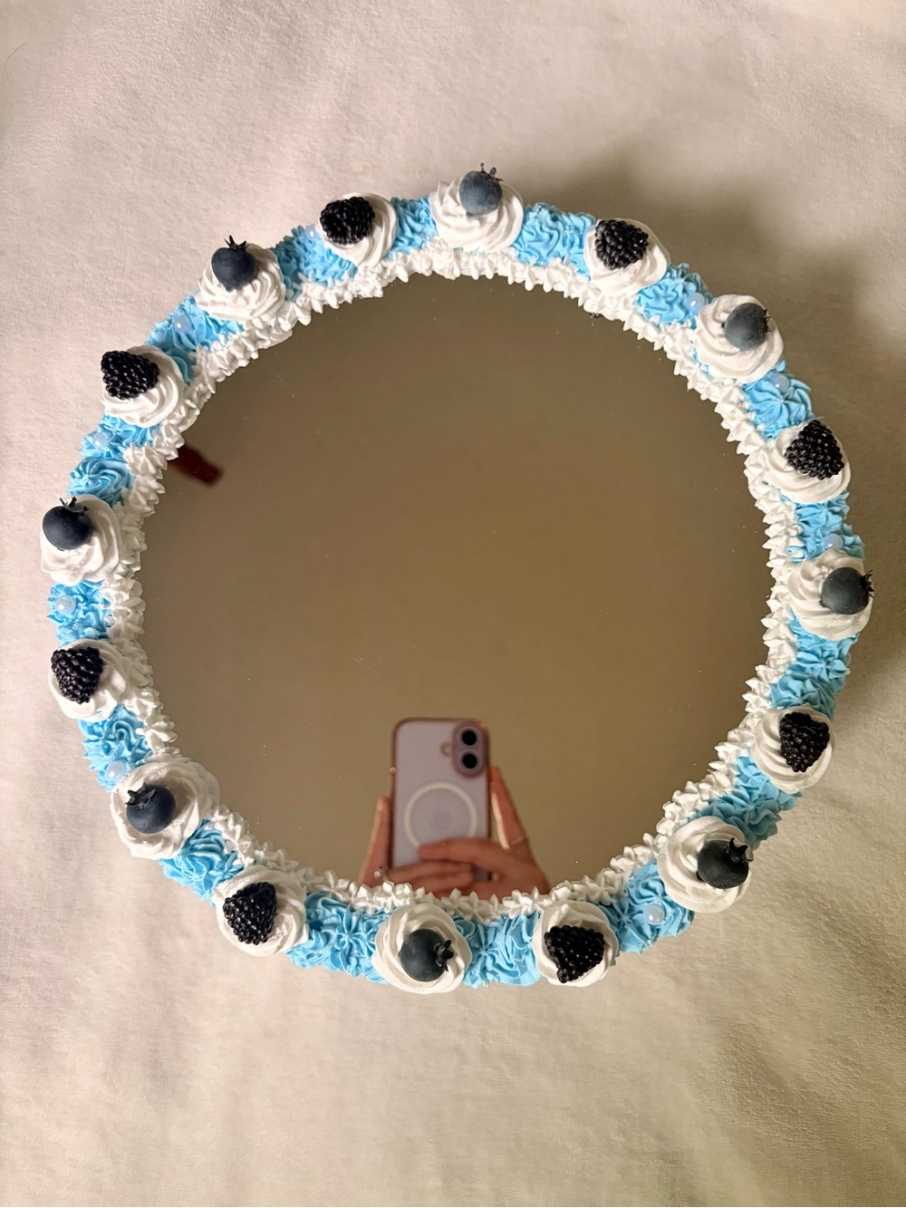 Round Blueberry/Blackberry Mirror with Blue and White Frosting Trim